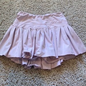 gold hinge pleasured tennis skirt